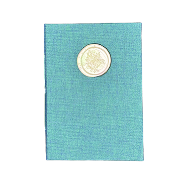 Turquoise textured book with a wax seal on a white background